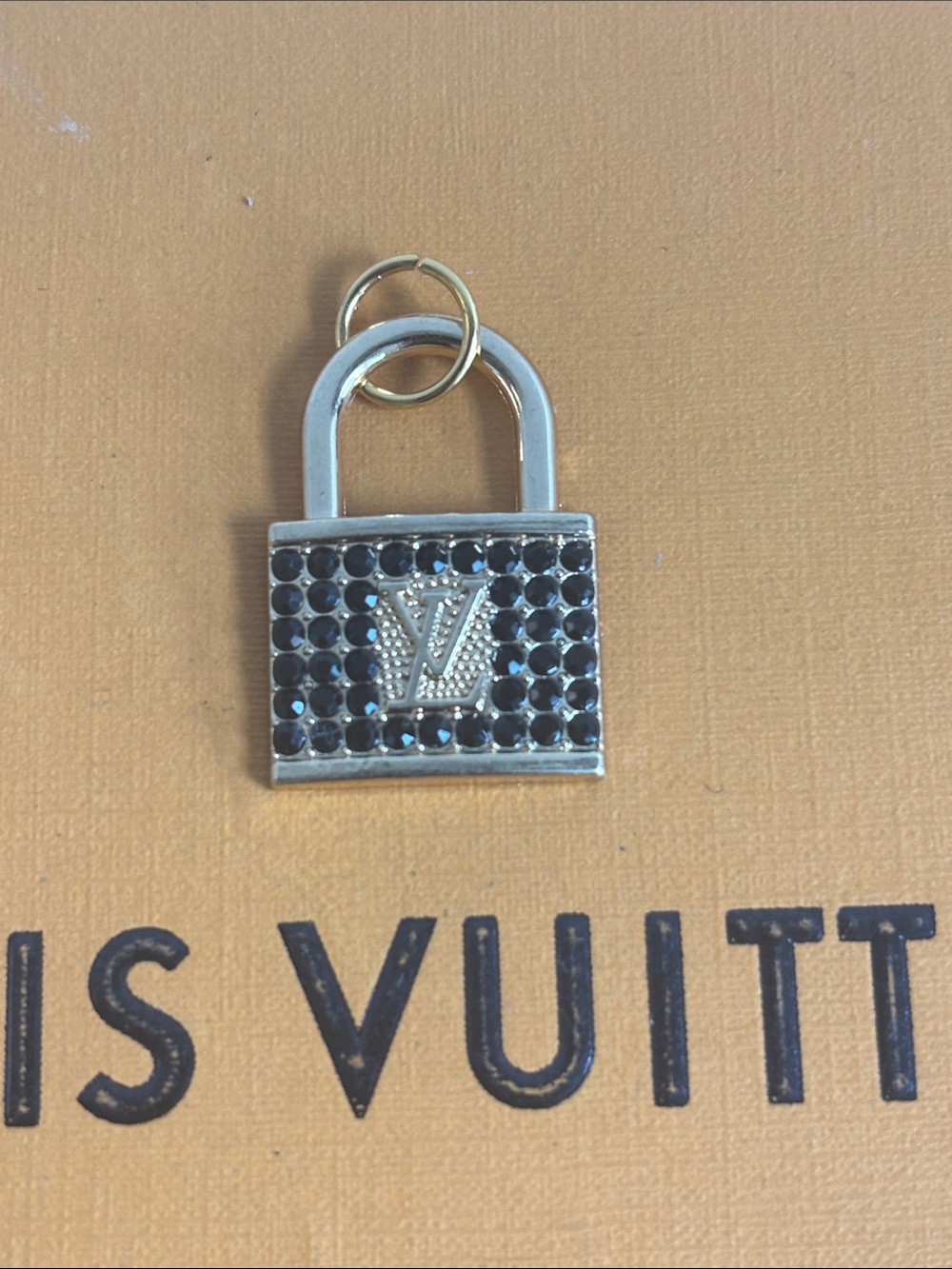 Louis Vuitton Gold Padlock Charm with Black Crystal Accents